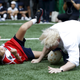 Boris Johnson falls over after colliding with a 10-year-old Japanese boy in what was supposed to be a gentle game of rugby.